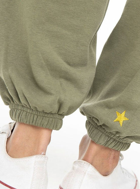 PANTALON DE BUZO CONVERSE METALLIC STAR