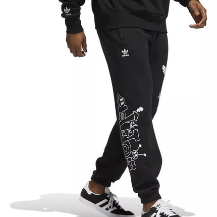 PANTALON DE BUZO ADIDAS ORIGINALS CARTOON GFX SP - BONZER