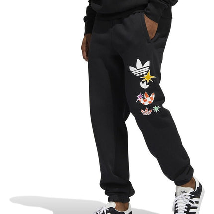 PANTALON DE BUZO ADIDAS ORIGINALS CARTOON GFX SP - BONZER